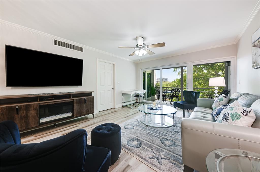 773 Jeffery Street, Unit 4305 Boca Raton, FL 33487 - Photo 9 of 22 a living room with furniture and a flat screen tv