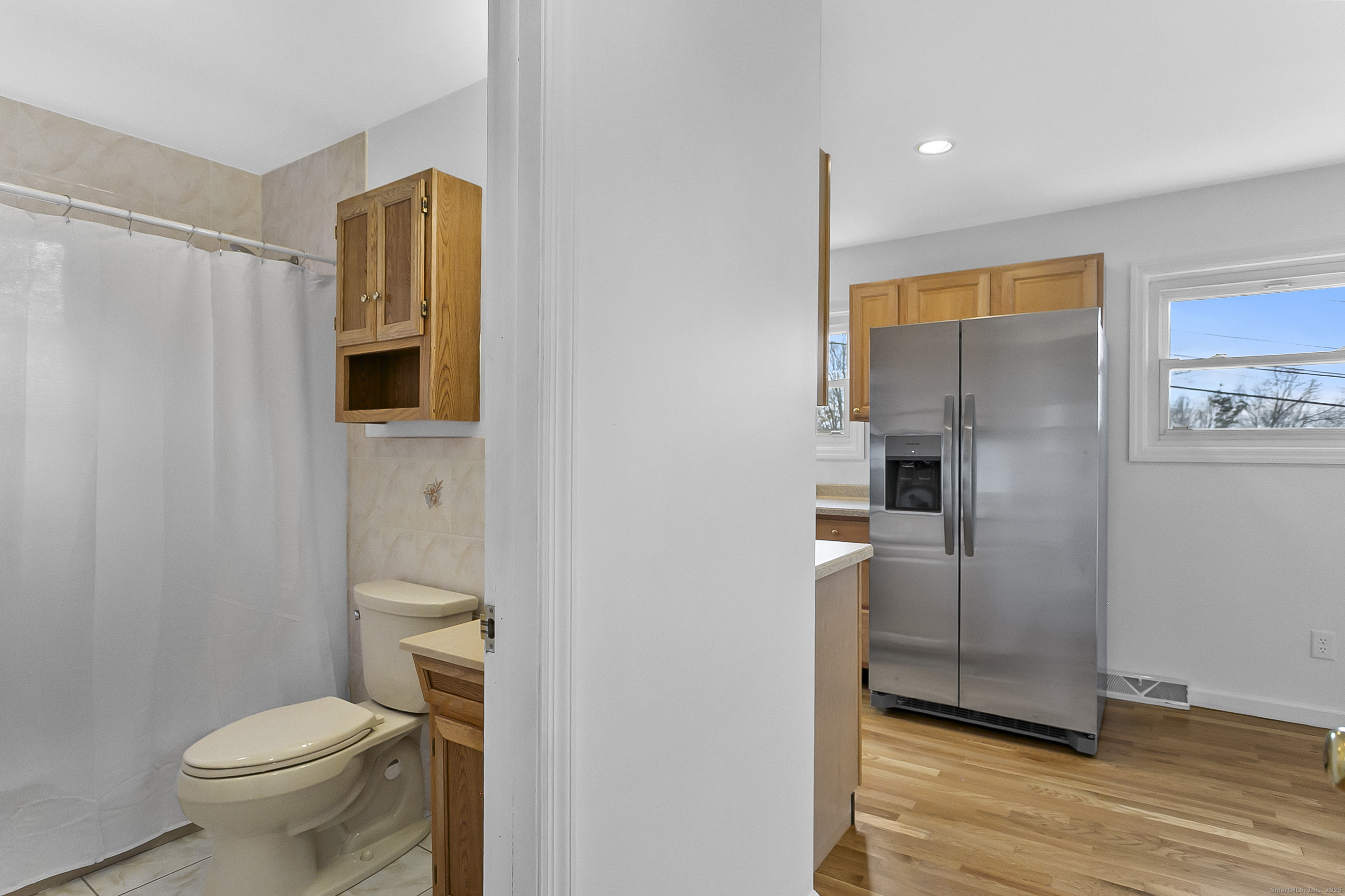 23 Berkshire Road Ansonia, CT 06401 - Photo 14 of 23 a bathroom with a toilet and a shower