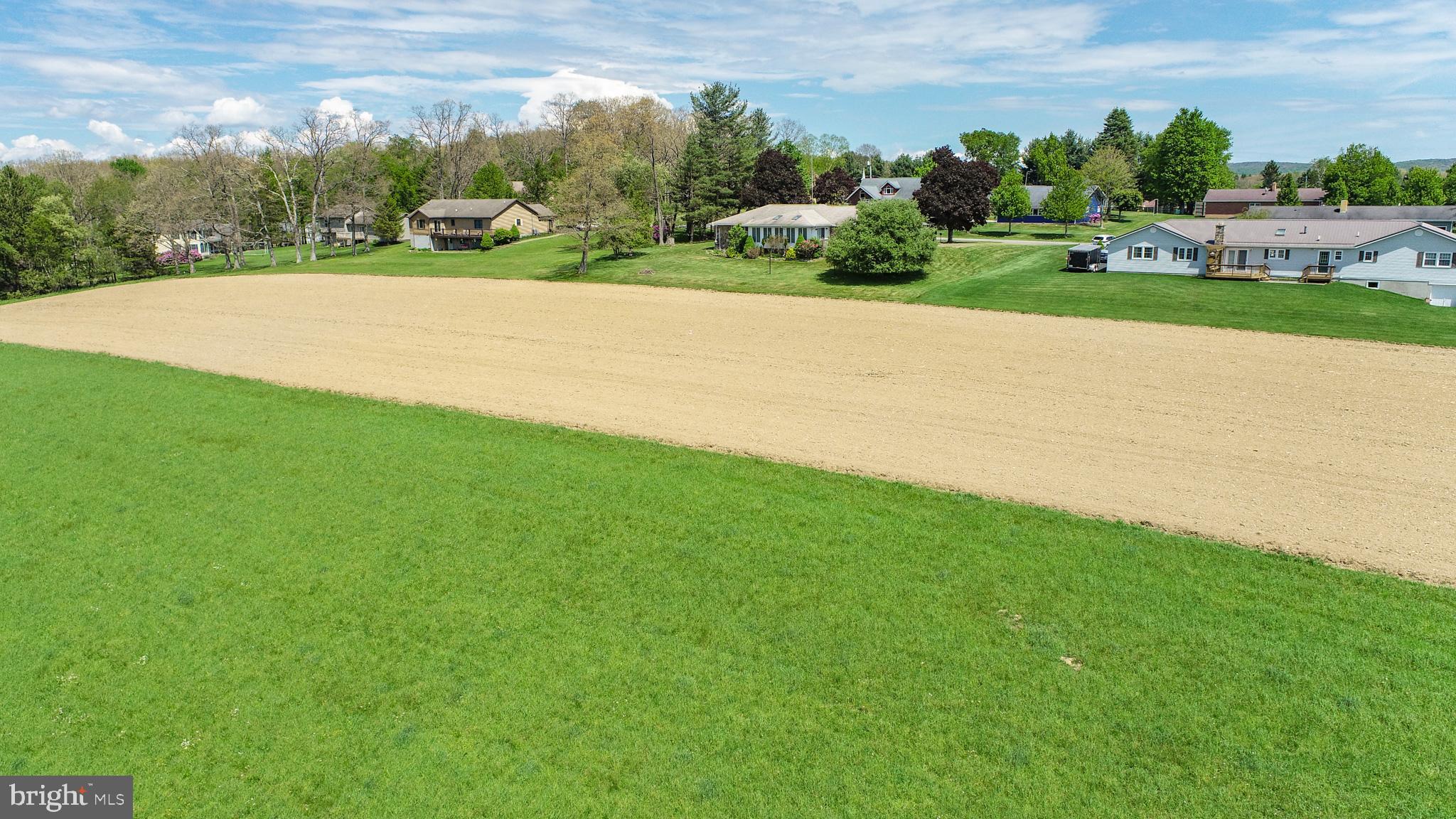 9.75-ac Dennett Road Oakland, MD 21550 - Photo 22 of 30 a view of a field of grass and trees