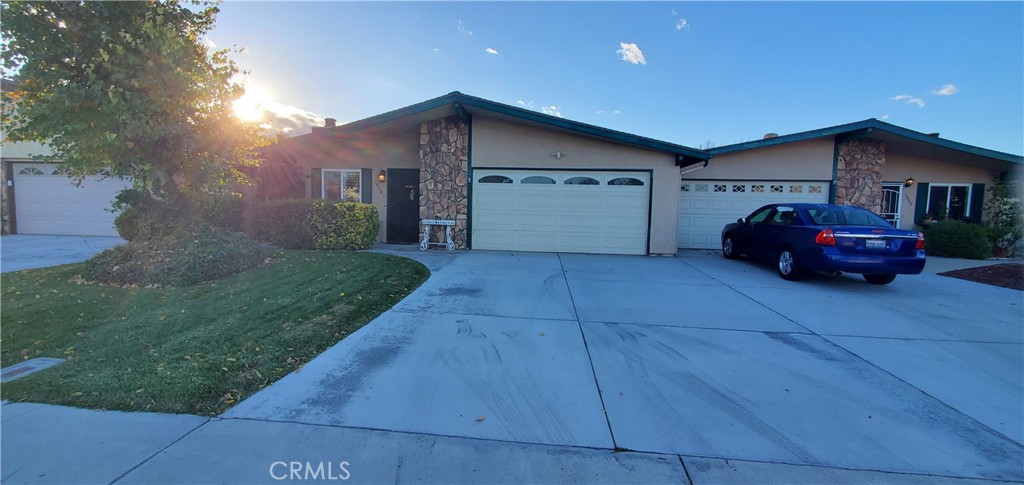 a house view with a garden space