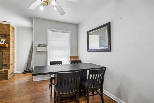a workspace with furniture and wooden floor