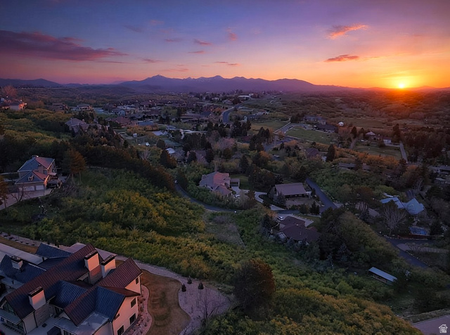 10667 Hidden Ridge Lane Sandy, UT 84092 - Photo 5 of 21 Aerial view of residential area with a mountain backdrop