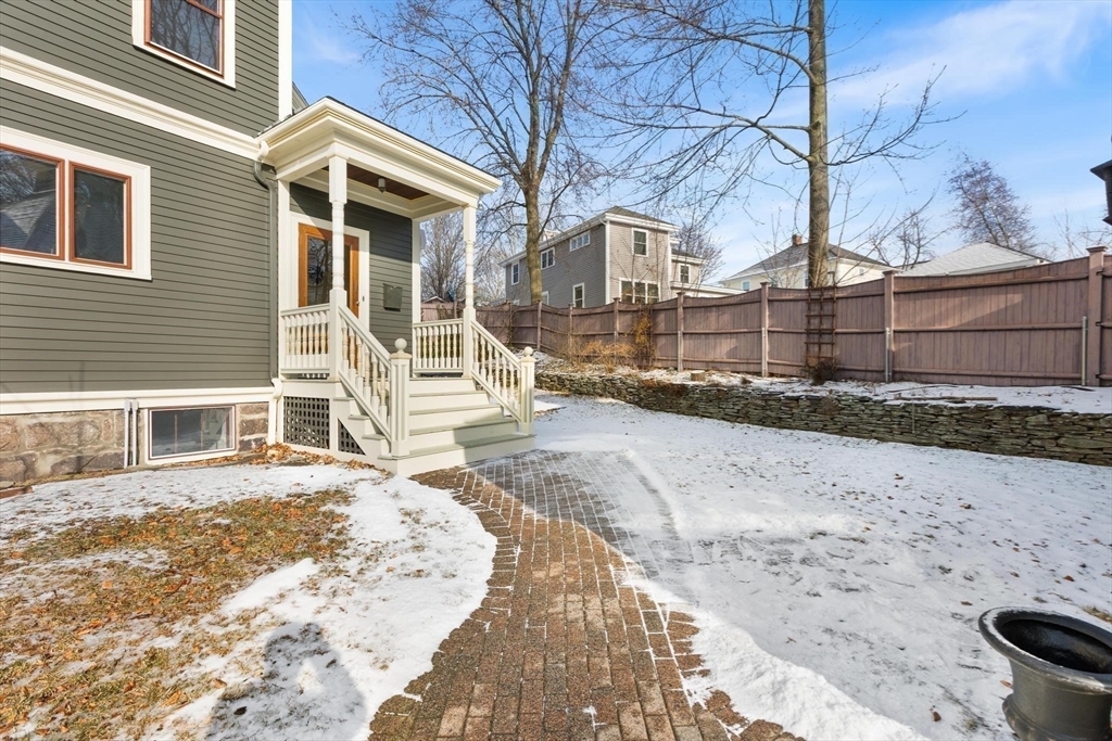 129 High Street Reading, MA 01867 - Photo 31 of 41 a view of a house with a yard