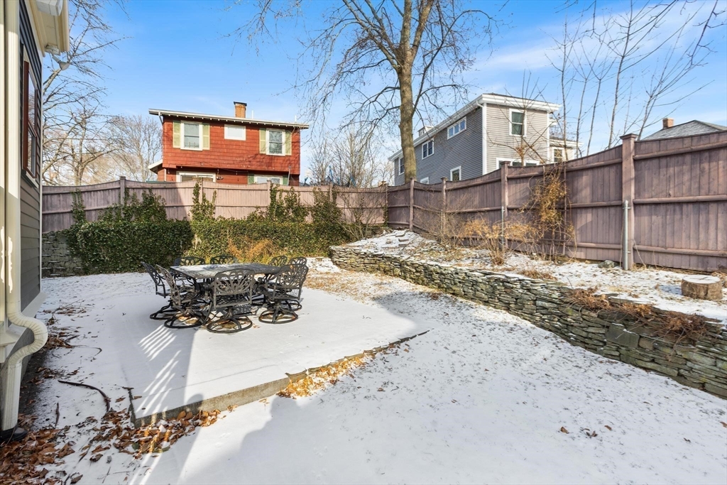 129 High Street Reading, MA 01867 - Photo 33 of 41 a view of a backyard