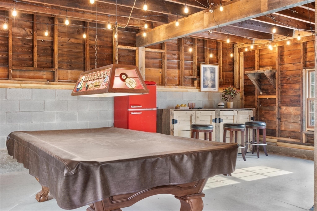 129 High Street Reading, MA 01867 - Photo 37 of 41 a view of a chairs and table in the patio