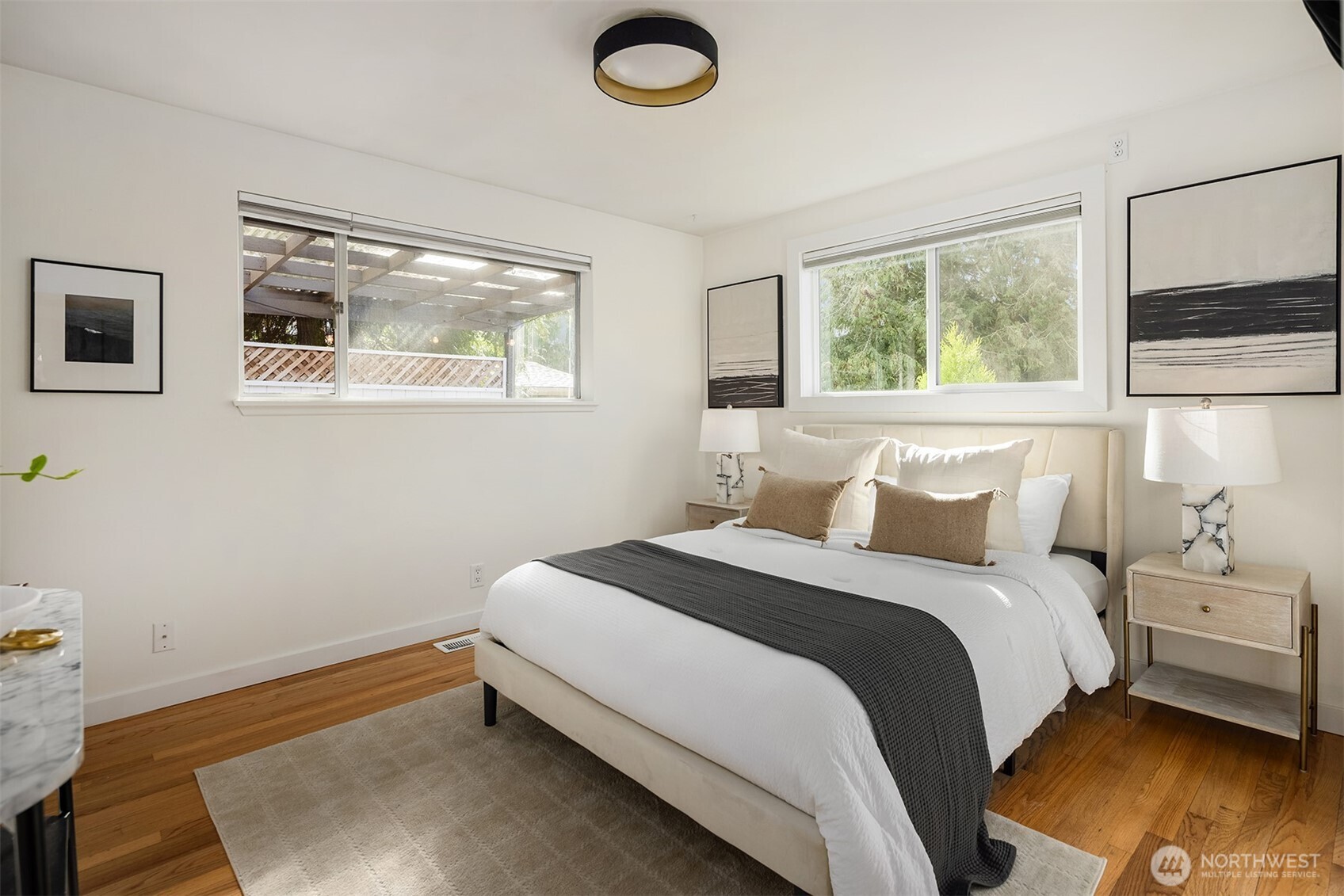 1237 Southwest 118th Street Burien, WA 98146 - Photo 16 of 27 a bedroom with a bed and a window