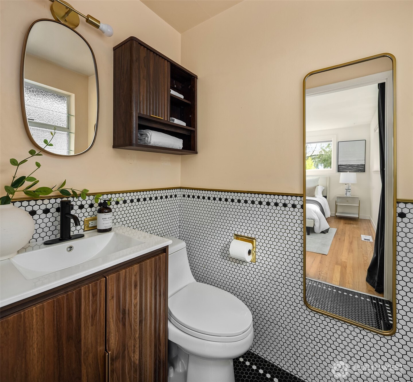 1237 Southwest 118th Street Burien, WA 98146 - Photo 18 of 27 a bathroom with a sink a mirror and a toilet