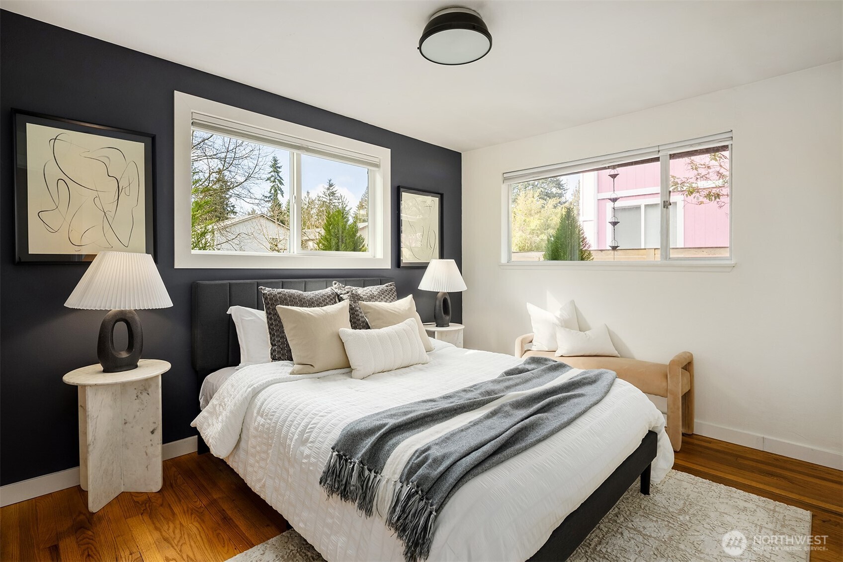 1237 Southwest 118th Street Burien, WA 98146 - Photo 19 of 27 a bedroom with a large bed and a window