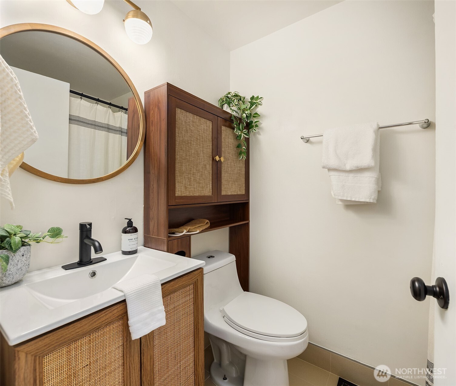 1237 Southwest 118th Street Burien, WA 98146 - Photo 21 of 27 a bathroom with a sink vanity mirror and toilet