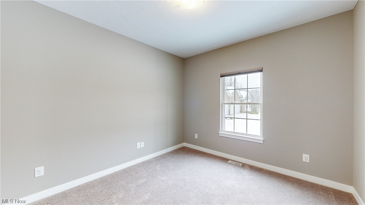 5035 SOM Center Road Solon, OH 44139 - Photo 13 of 23 Empty room featuring light colored carpet