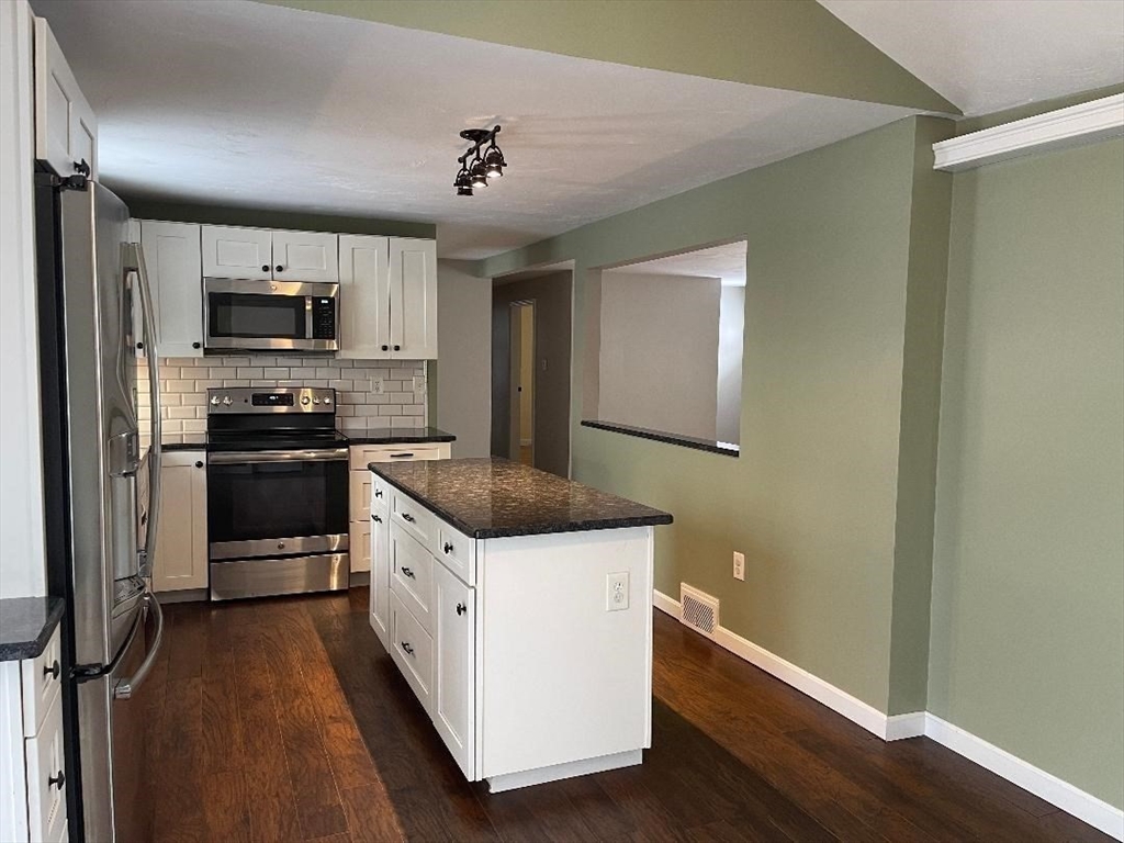 23 Western Avenue West Boylston, MA 01583 - Photo 3 of 18 a kitchen with a sink and stainless steel appliances