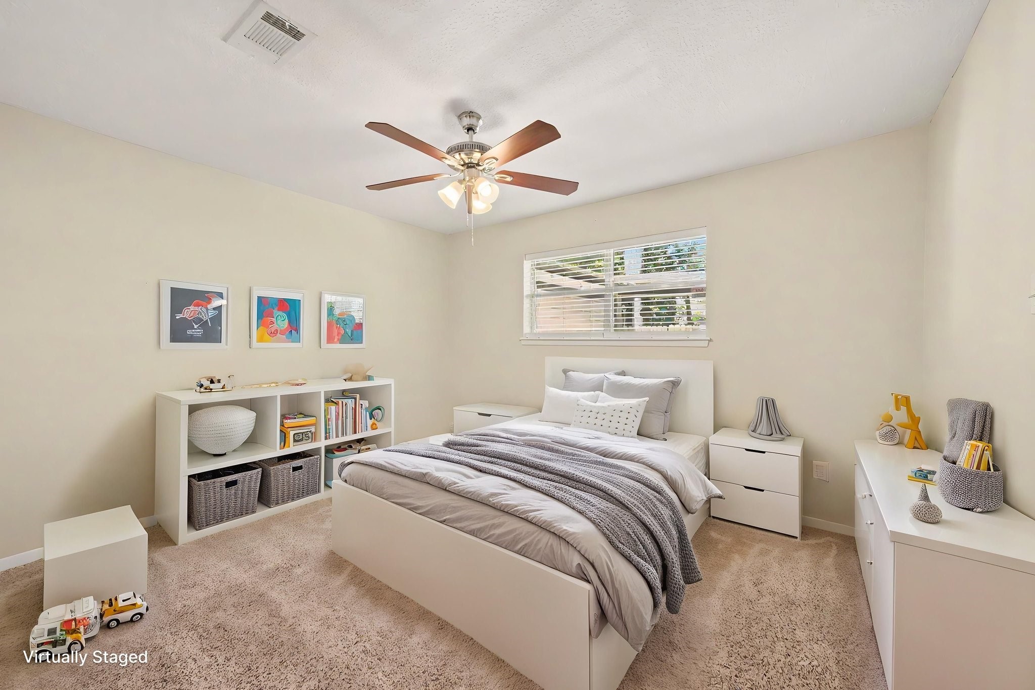 17419 Cassina Drive Spring, TX 77388 - Photo 25 of 35 a bedroom with a bed and a chandelier