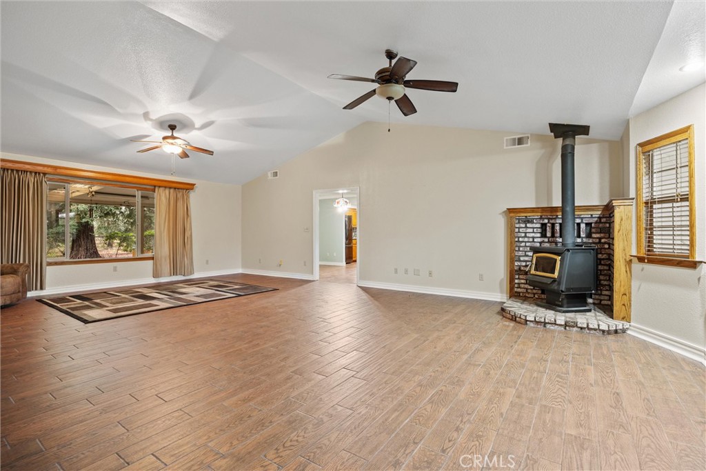 24235 Moon Corning, CA 96021 - Photo 13 of 58 a view of livingroom with furniture workspace and window