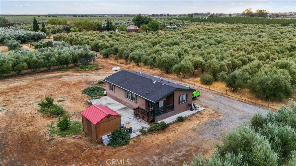 24235 Moon Corning, CA 96021 - Photo 2 of 58 an aerial view of a house with mountain view