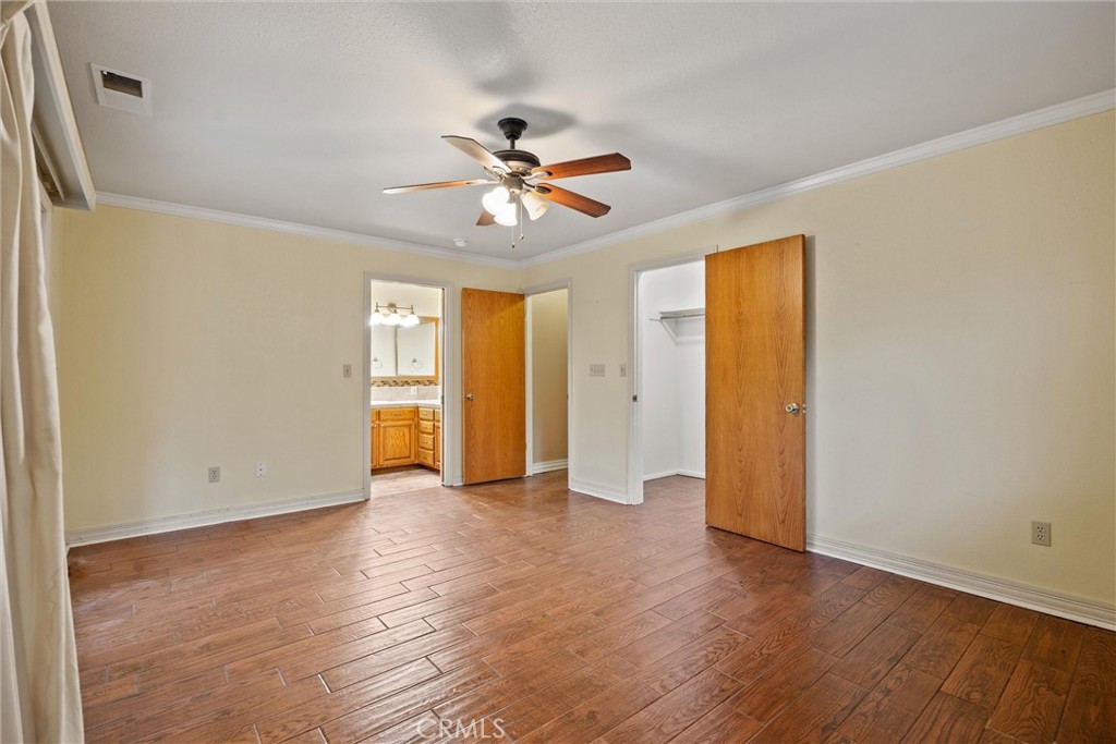 24235 Moon Corning, CA 96021 - Photo 25 of 58 a view of an empty room with window and wooden floor