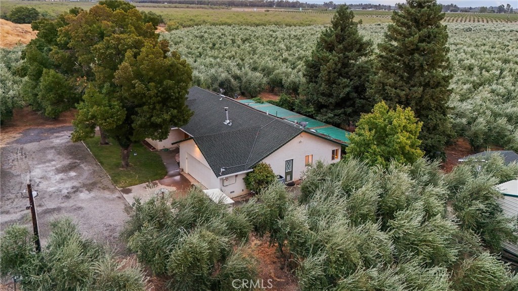 24235 Moon Corning, CA 96021 - Photo 44 of 58 an aerial view of house with yard