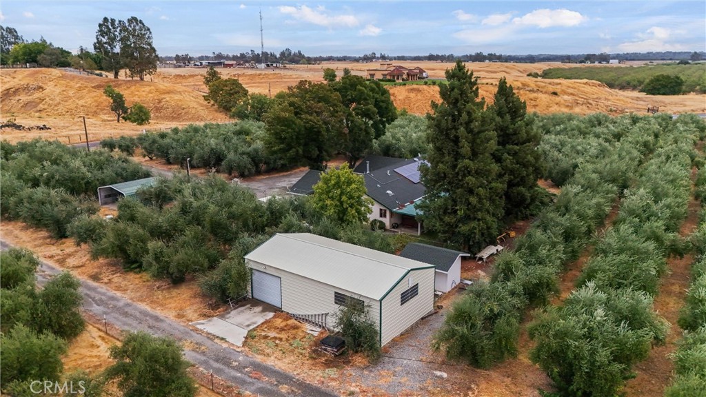 24235 Moon Corning, CA 96021 - Photo 50 of 58 an aerial view of a house with lake view