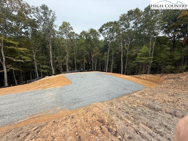 Peck Peak Road Jefferson, NC 28640 - Photo 11 of 22 a space with trees in the background