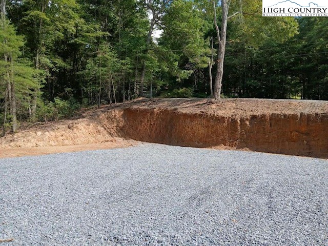 Peck Peak Road Jefferson, NC 28640 - Photo 5 of 22 a view of backyard with large trees