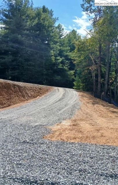 Peck Peak Road Jefferson, NC 28640 - Photo 7 of 22 a view of a backyard of the house