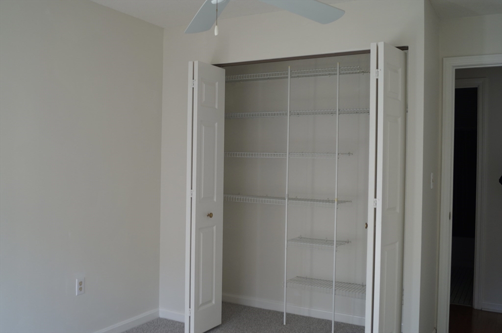 200 Ledgewood Drive, Unit 205 Stoneham, MA 02180 - Photo 17 of 18 a bathroom with a shower