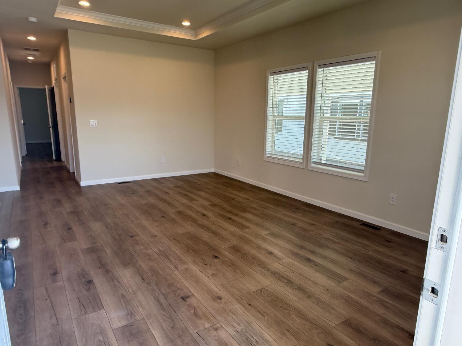 Undisclosed Address Medford, OR 97501 - Photo 2 of 23 a view of an empty room with wooden floor and a window