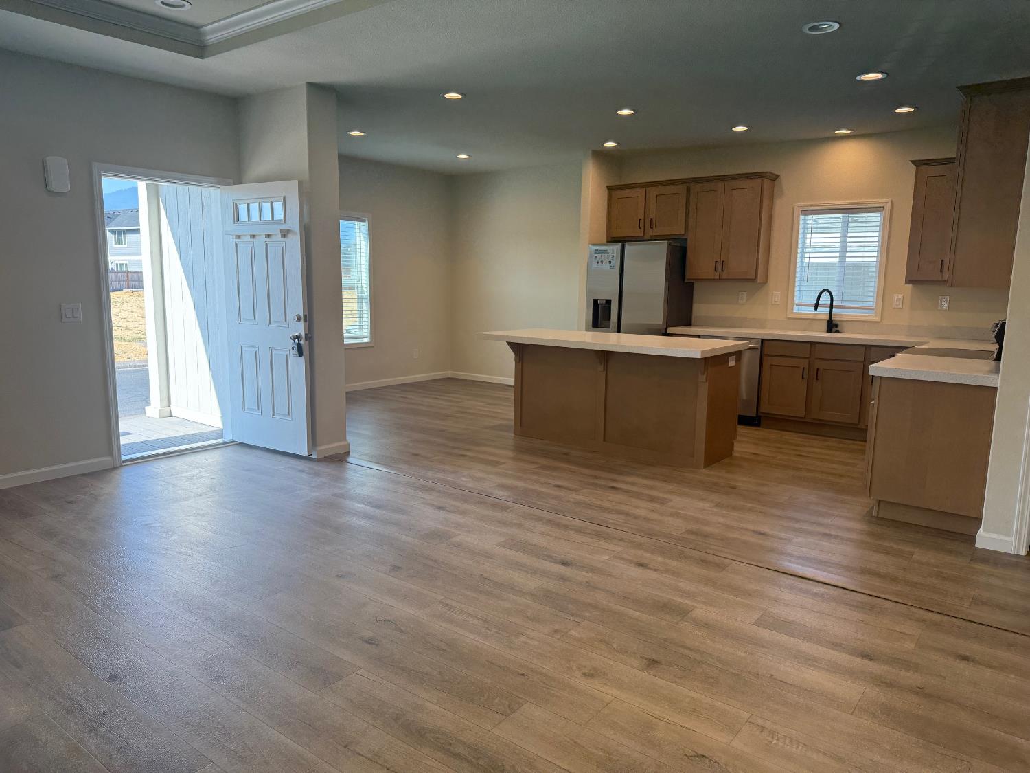 Undisclosed Address Medford, OR 97501 - Photo 4 of 23 a view of kitchen with cabinets and wooden floor