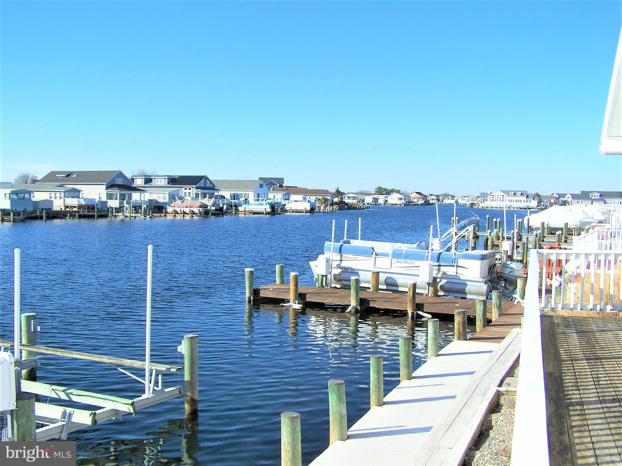 153 Pine Tree Road Ocean City, MD 21842 - Photo 14 of 77 West View of Canal from Deck