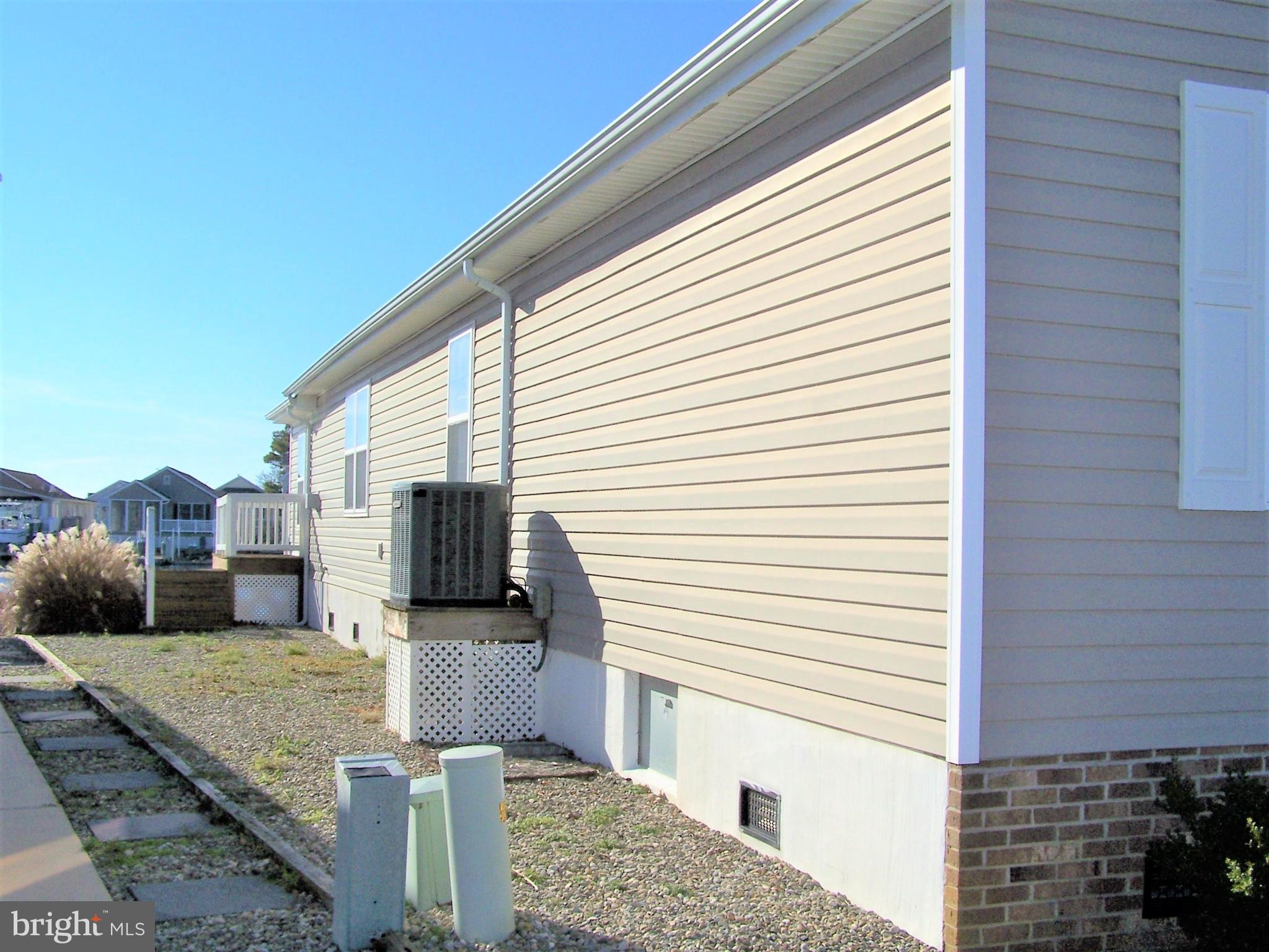 153 Pine Tree Road Ocean City, MD 21842 - Photo 5 of 77 Left Front Elevation