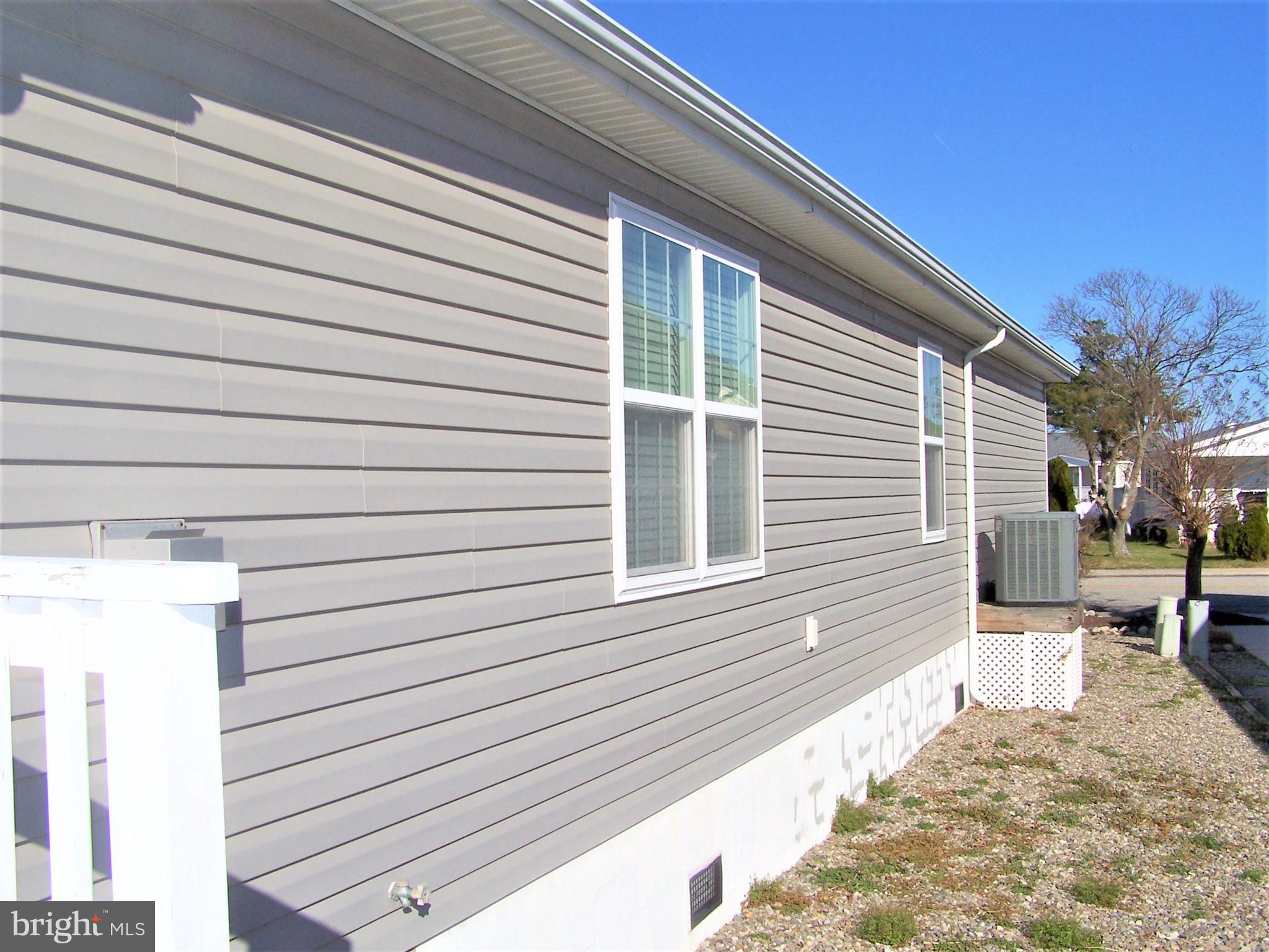 153 Pine Tree Road Ocean City, MD 21842 - Photo 6 of 77 Left Rear Elevation