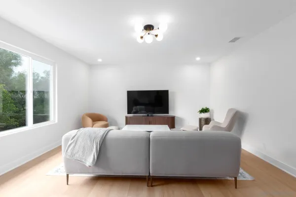 a view of entryway with stairs and wooden floor