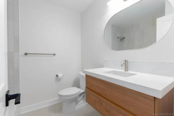 a view of a house with backyard sitting area and garden