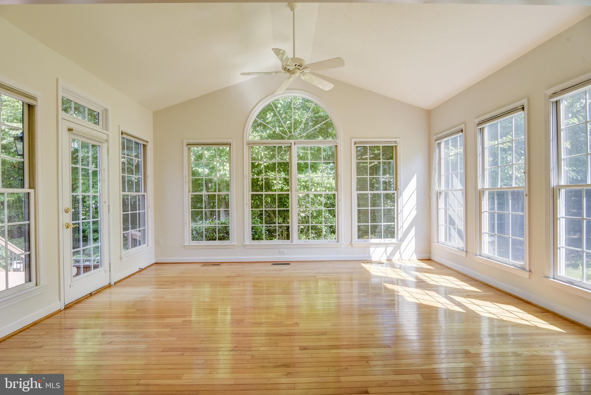7428 Spring Summit Road Springfield, VA 22150 - Photo 20 of 70 From the family room to this gorgeous sun room!