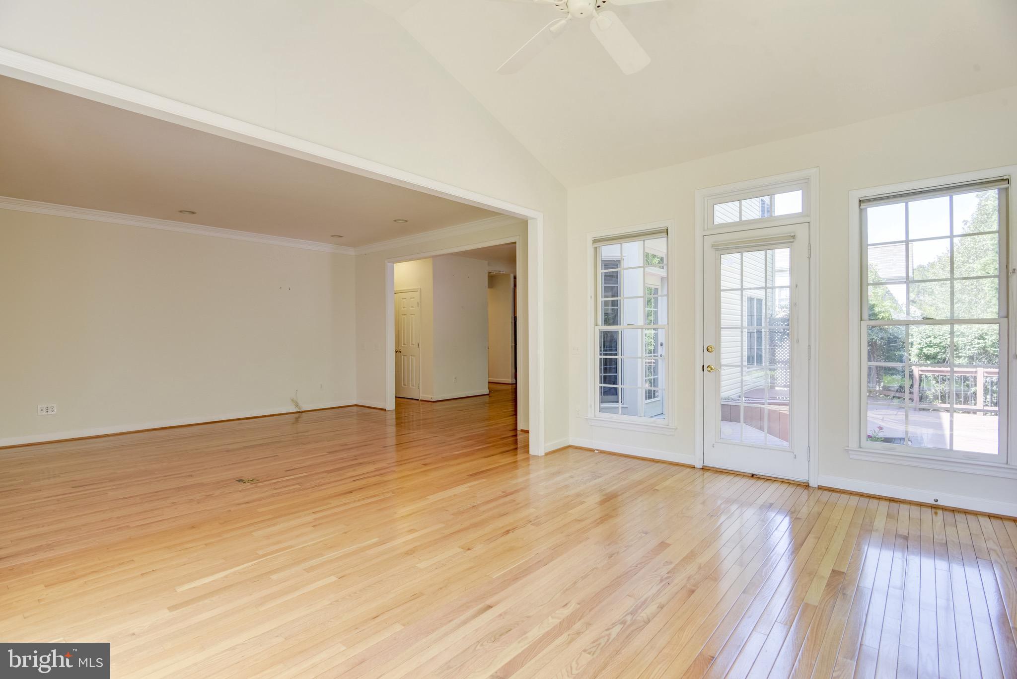 7428 Spring Summit Road Springfield, VA 22150 - Photo 23 of 70 Doors to the deck from sunroom & breakfast area