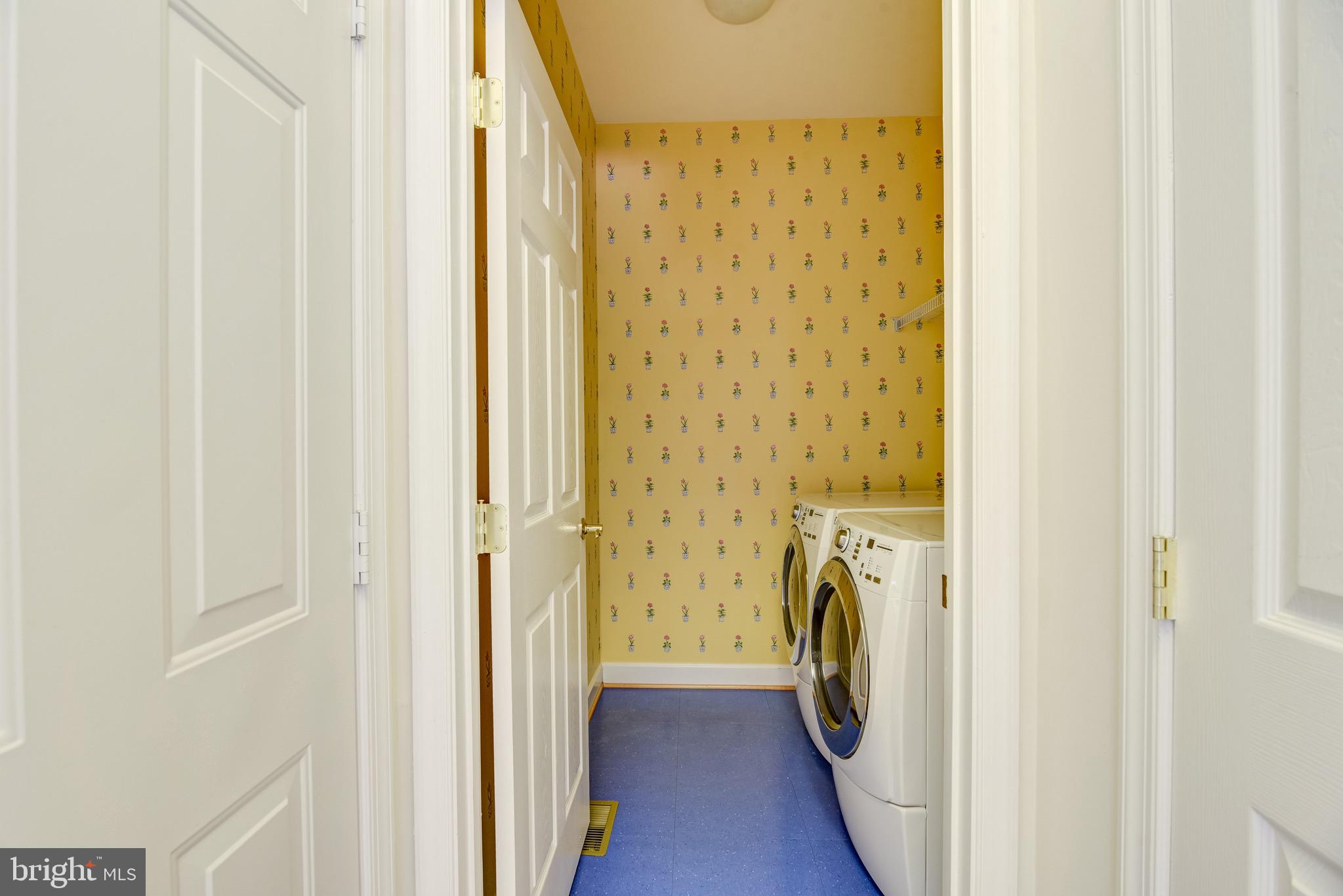 7428 Spring Summit Road Springfield, VA 22150 - Photo 30 of 70 Front loading Washer & Dryer in main-floor laundry