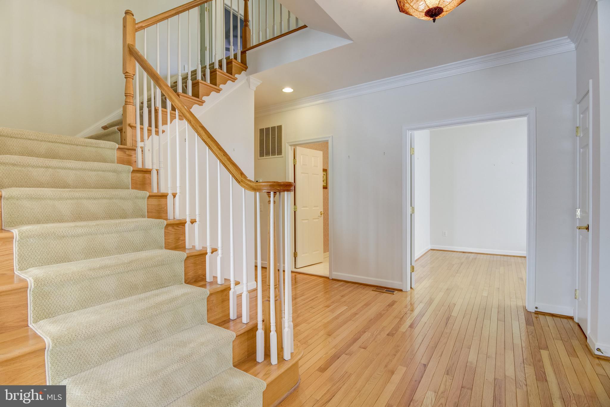 7428 Spring Summit Road Springfield, VA 22150 - Photo 32 of 70 Open stairway to bedroom level