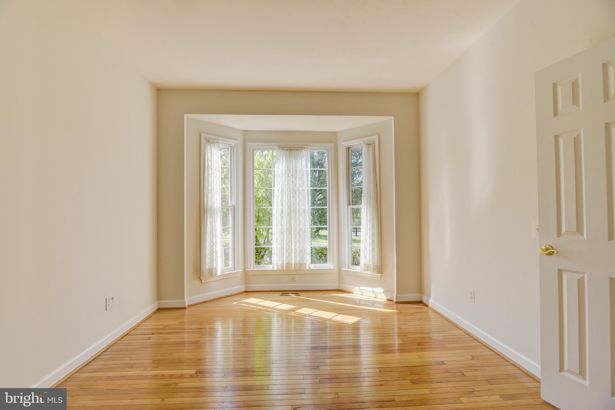 7428 Spring Summit Road Springfield, VA 22150 - Photo 6 of 70 Double door entry into den * Bay window