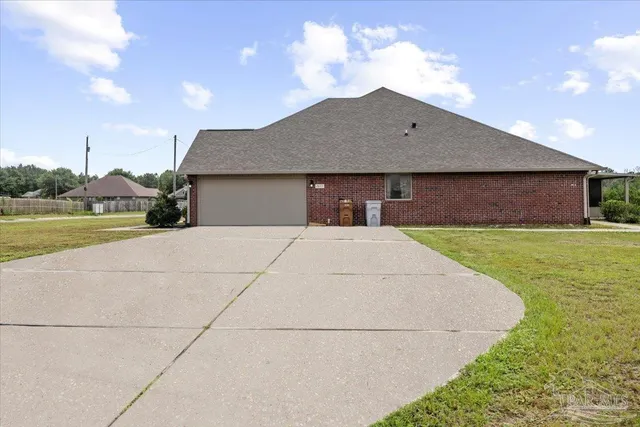 a house view with a garden space