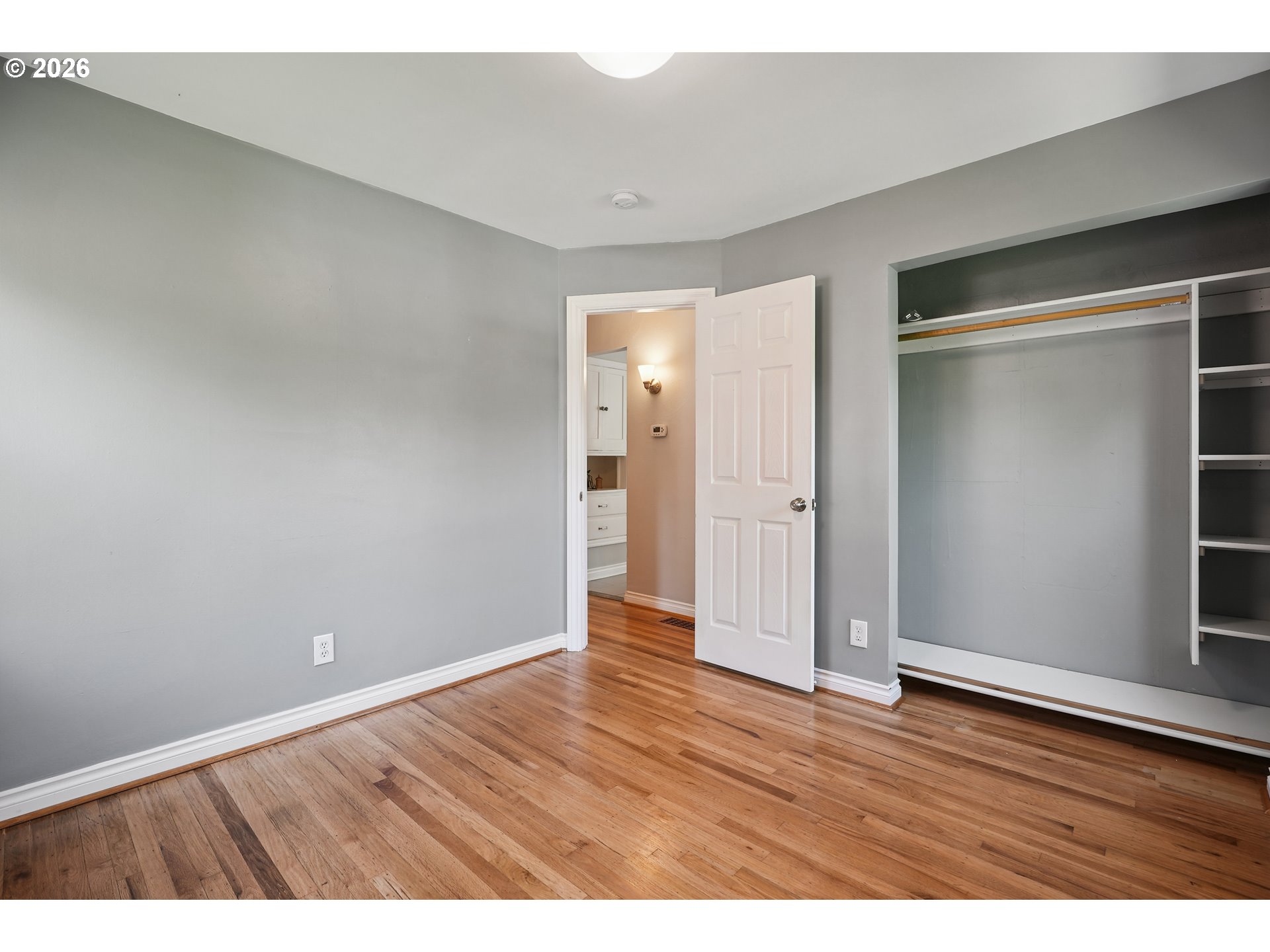 6406 Southeast 45th Avenue Portland, OR 97206 - Photo 15 of 39 a view of an empty room with wooden floor