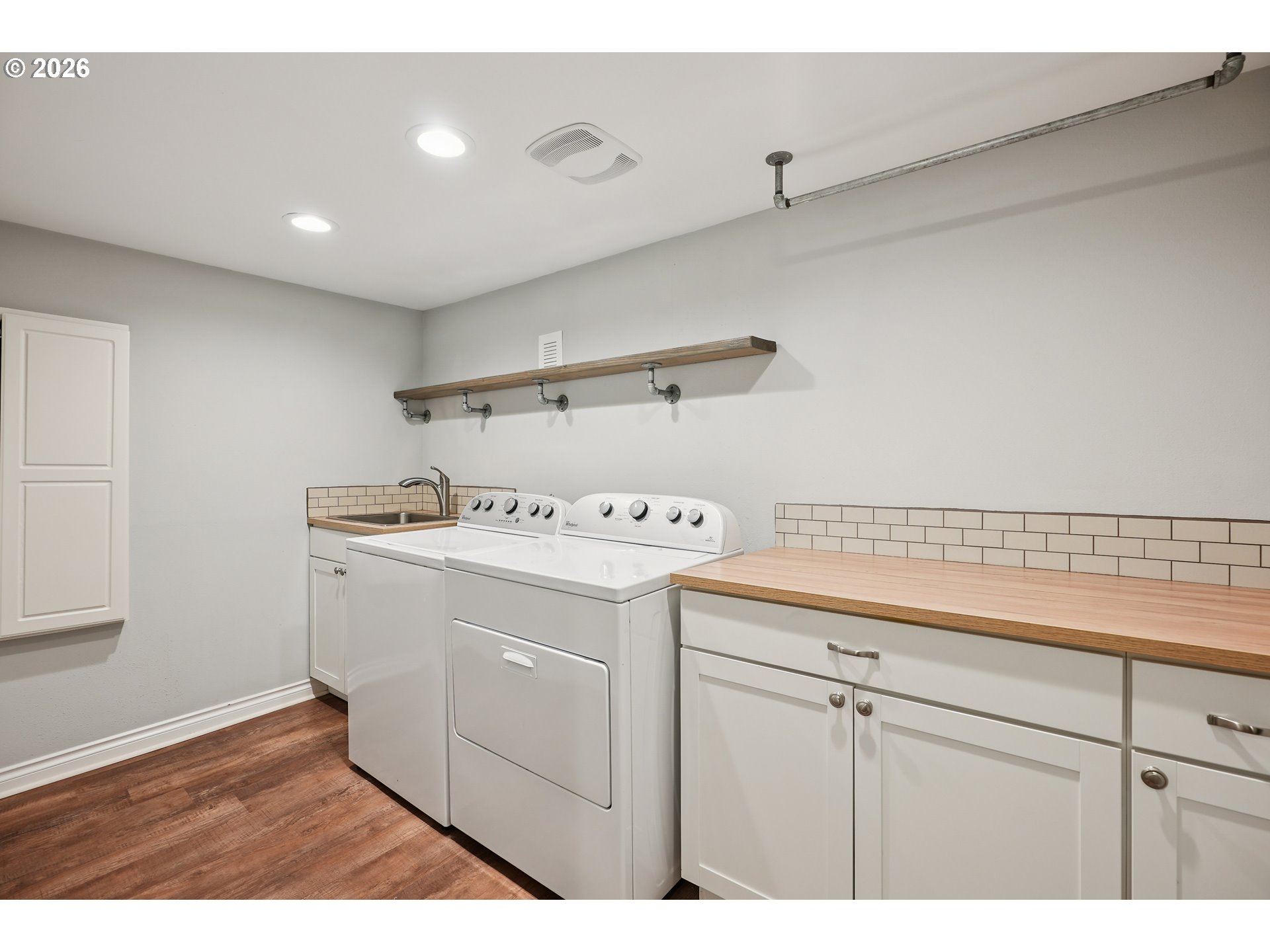 6406 Southeast 45th Avenue Portland, OR 97206 - Photo 22 of 39 a view of storage and utility room with washer and dryer