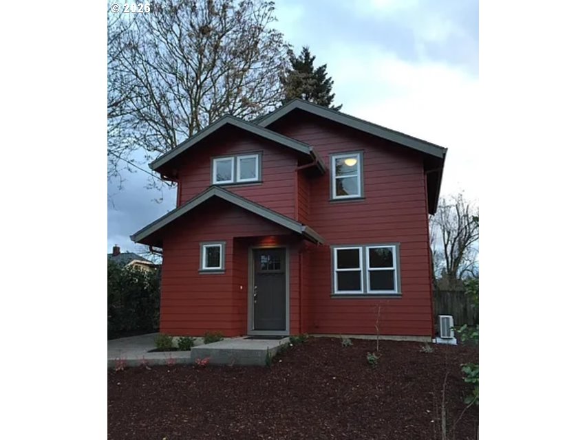 6406 Southeast 45th Avenue Portland, OR 97206 - Photo 29 of 39 a front view of a house with a yard