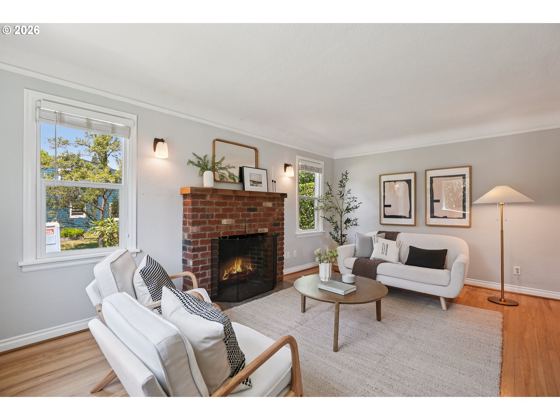 6406 Southeast 45th Avenue Portland, OR 97206 - Photo 3 of 39 a living room with furniture and a fireplace