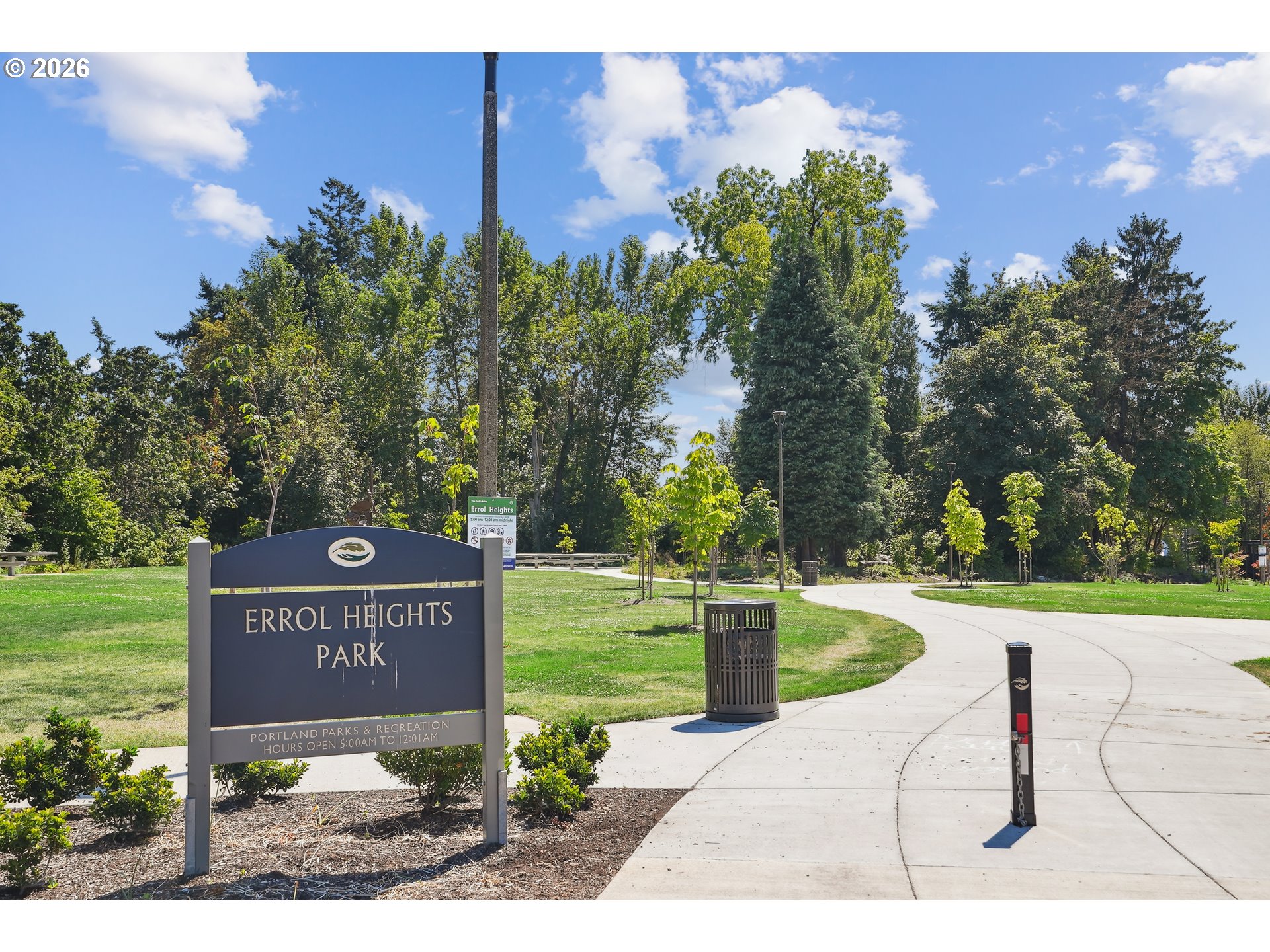 6406 Southeast 45th Avenue Portland, OR 97206 - Photo 38 of 39 a sign that is sitting on a brick wall