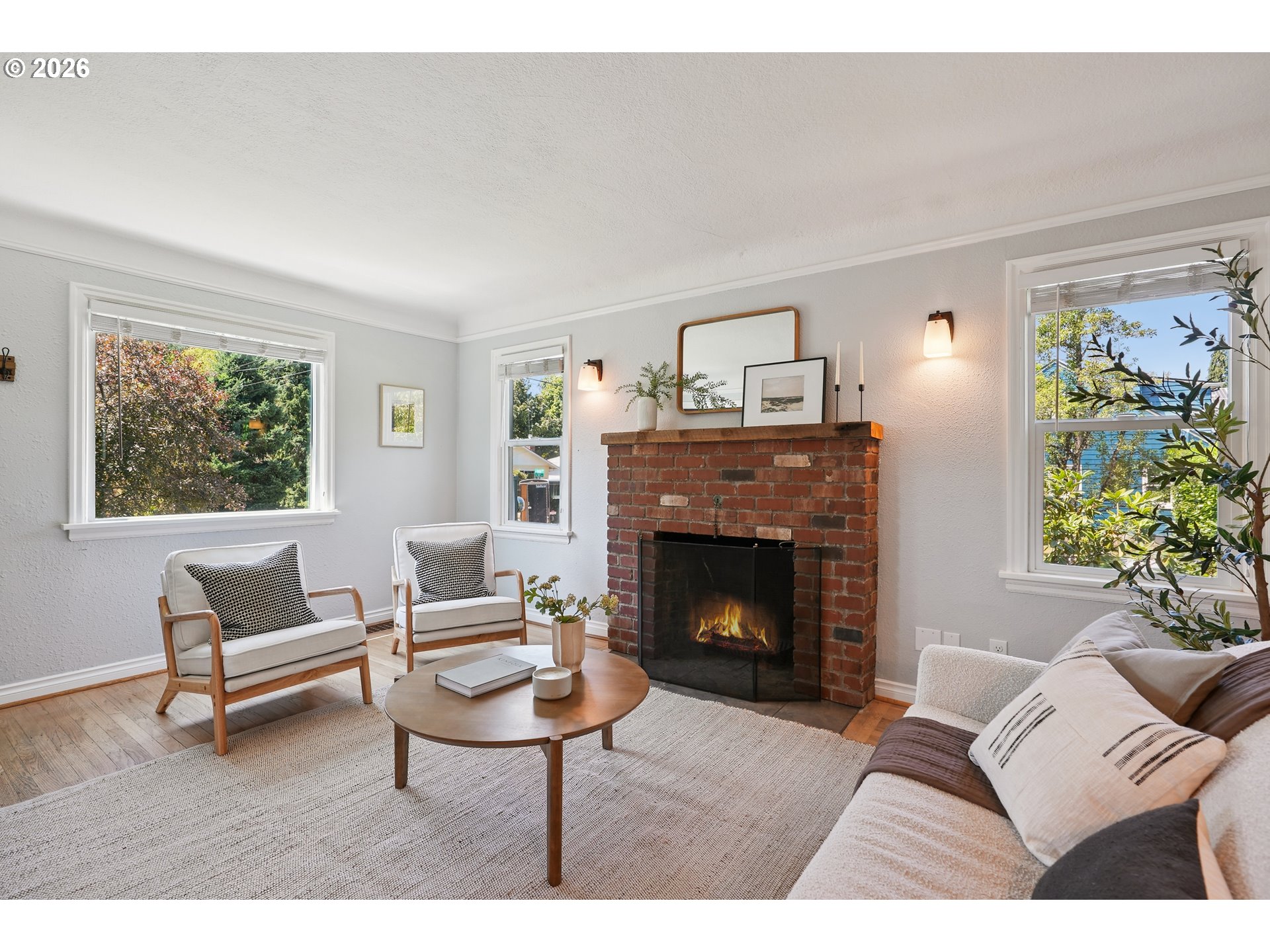 6406 Southeast 45th Avenue Portland, OR 97206 - Photo 5 of 39 a living room with furniture and a fireplace