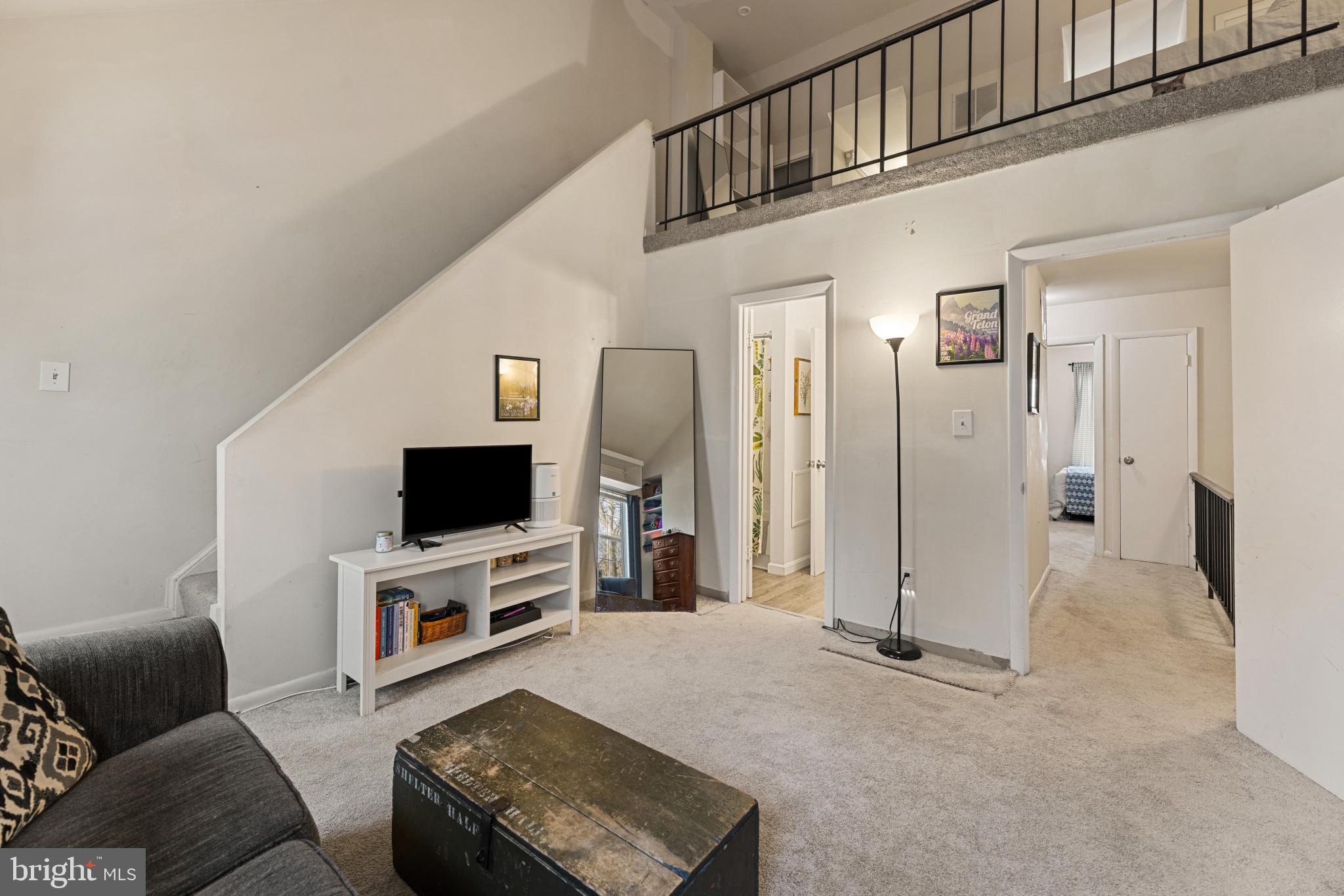 3671 Tavern Way Triangle, VA 22172 - Photo 7 of 18 a living room with furniture and a flat screen tv