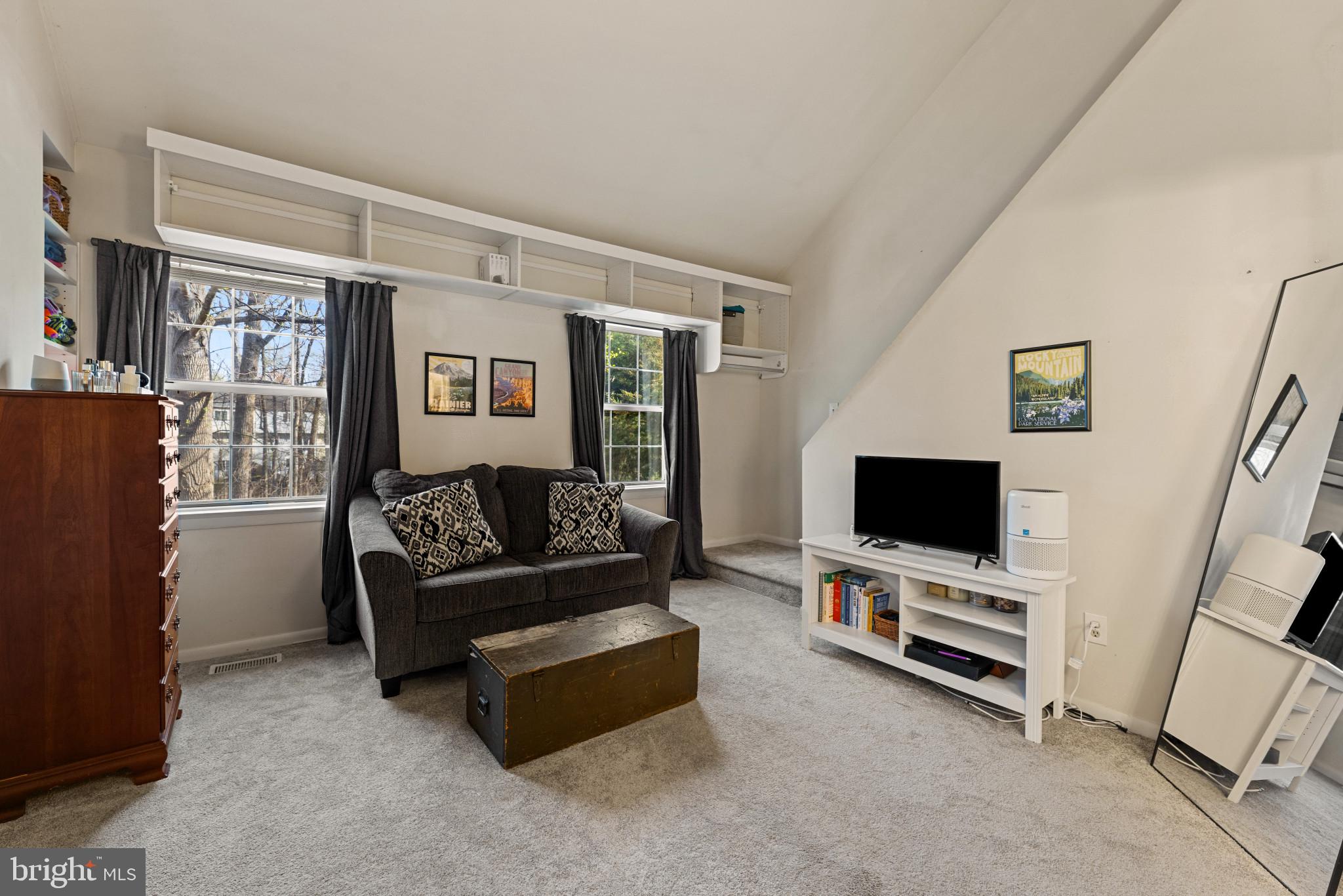 3671 Tavern Way Triangle, VA 22172 - Photo 8 of 18 a living room with furniture and a flat screen tv