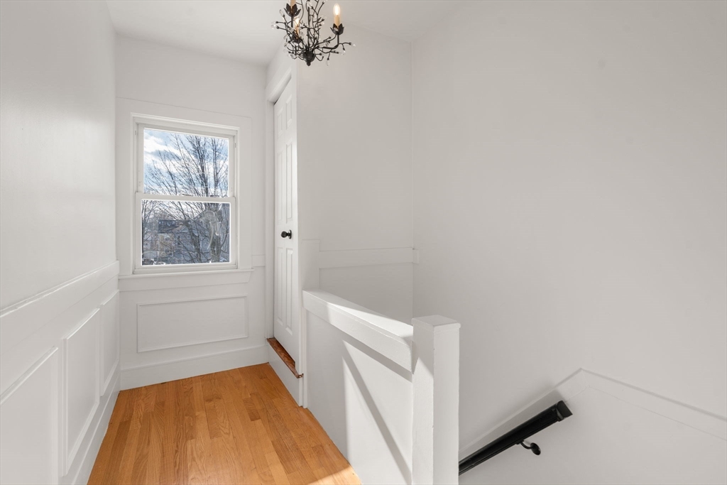 215 Ash Street, Unit 3 Waltham, MA 02453 - Photo 6 of 18 a view of bathroom with bathtub and window