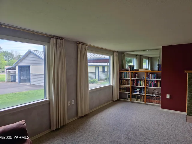 a room with furniture and window