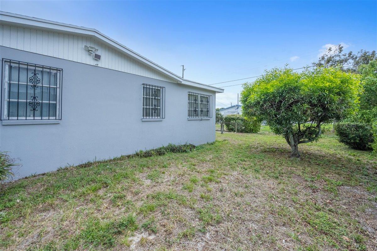 1153 West 25th Street Riviera Beach, FL 33404 - Photo 19 of 24 Western Elevation