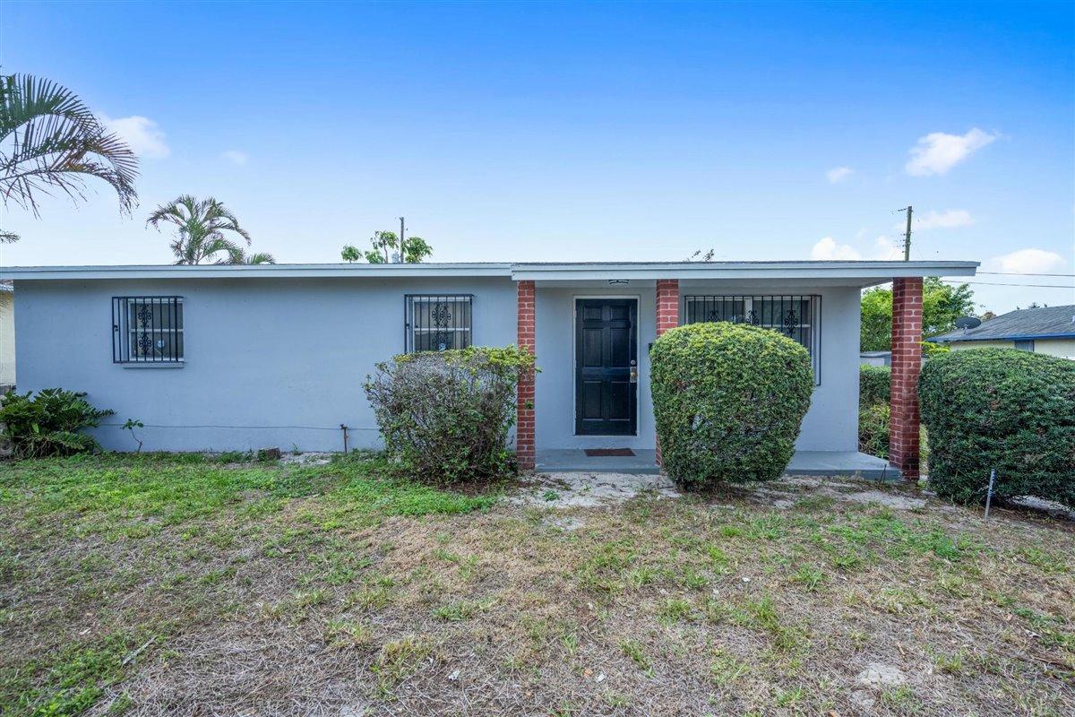 1153 West 25th Street Riviera Beach, FL 33404 - Photo 2 of 24 Exterior/Front